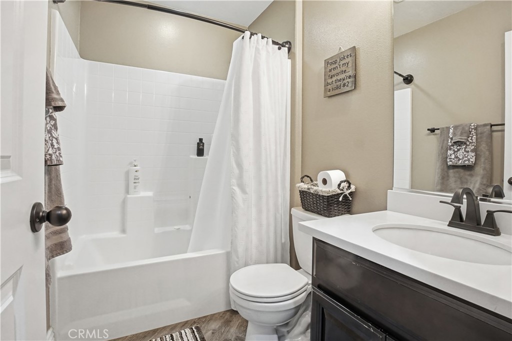 25654 Red Hawk Road Corona, CA 92883 - Photo 40 of 75 a bathroom with a sink toilet and shower