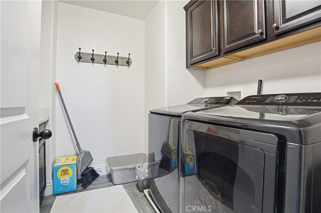 25654 Red Hawk Road Corona, CA 92883 - Photo 41 of 75 a utility room with dryer and washer