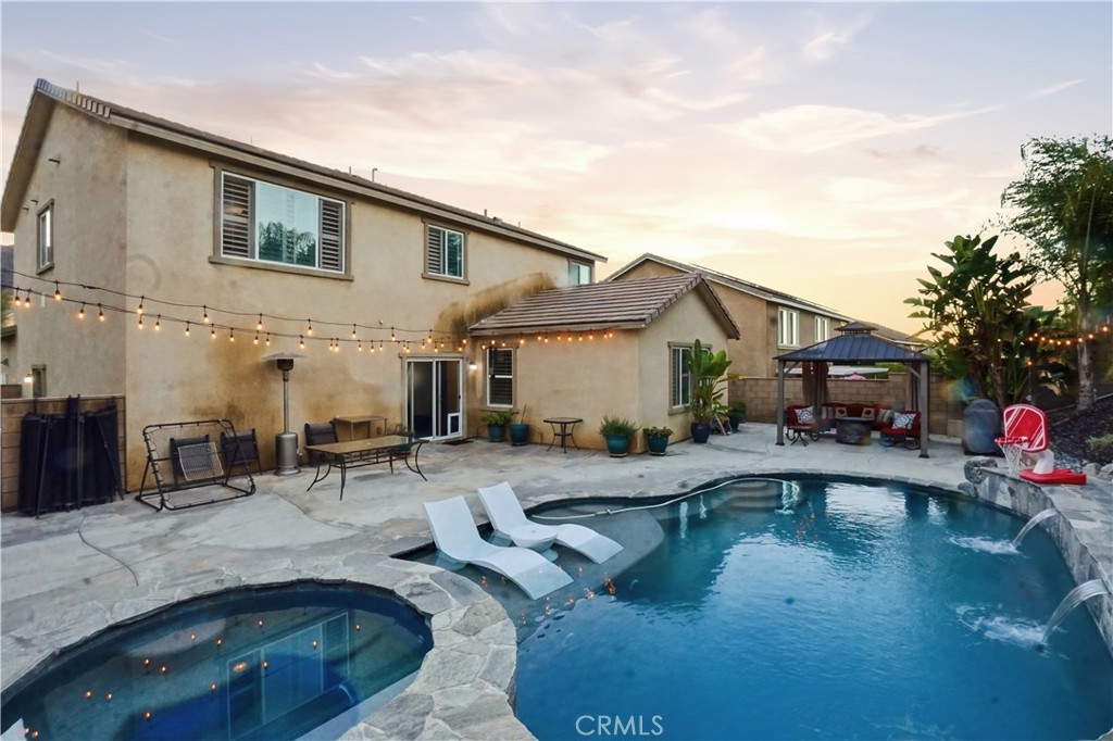 25654 Red Hawk Road Corona, CA 92883 - Photo 43 of 75 a swimming pool view with a outdoor seating