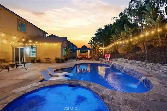 an aerial view of a house with outdoor space