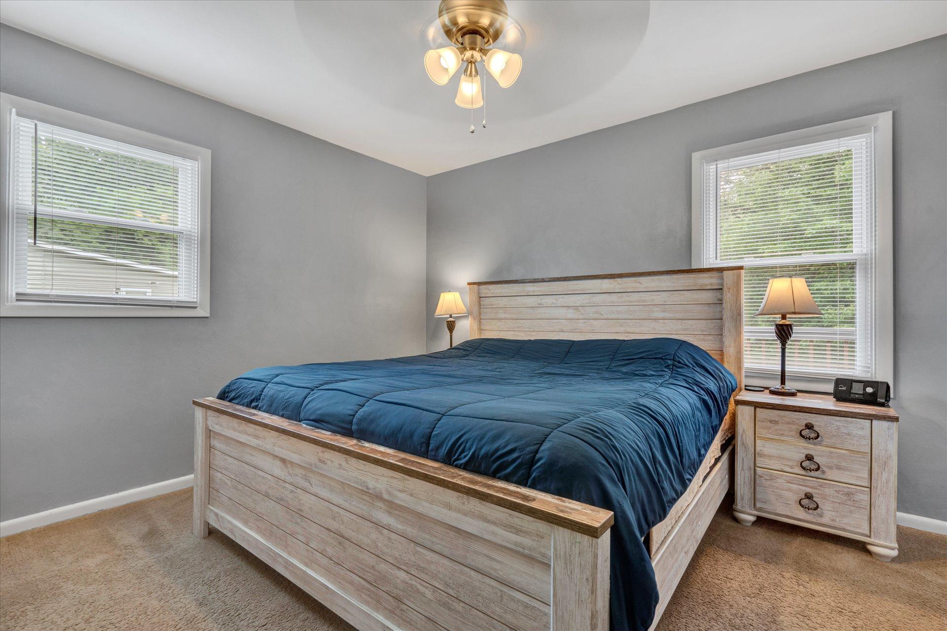 3382 Thomasson Mill Road Goodview, VA 24095 - Photo 15 of 20 a bedroom with a bed and a window