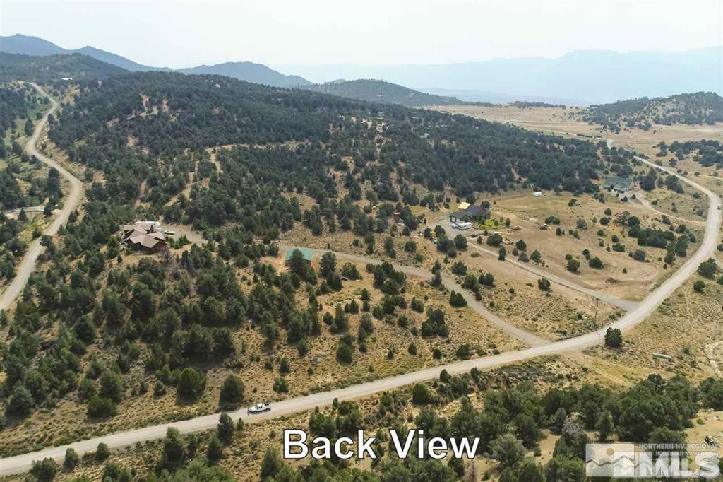 21455 Saddleback Road Reno, NV 89521 - Photo 6 of 8 a view of a field with a mountain in the background