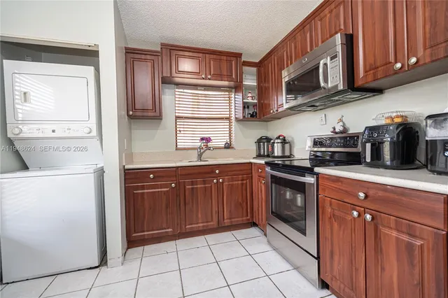 $340,000 | 15235 Southwest 64th Terrace, Unit 935, Miami, FL 33193