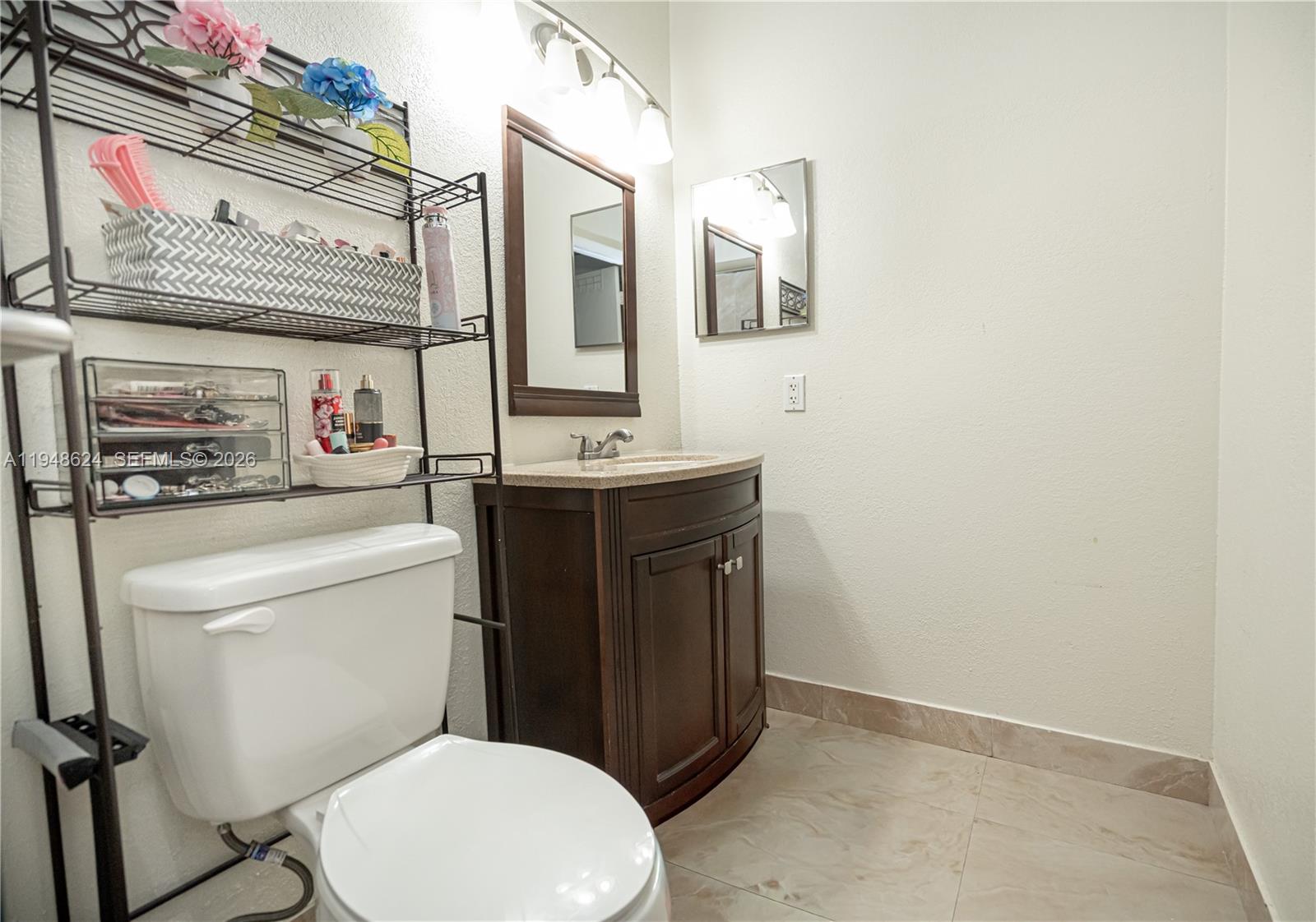 15235 Southwest 64th Terrace, Unit 935 Miami, FL 33193 - Photo 10 of 26 Master Bath