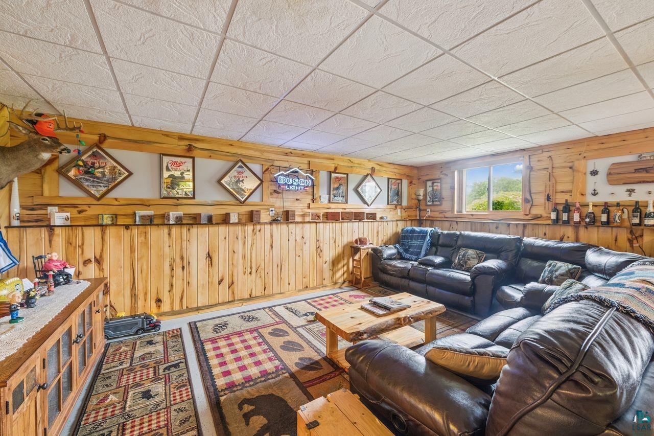 48424 Beaser Road Ashland, WI 54806 - Photo 13 of 30 Living area with wooden walls