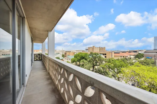 a view of a livingroom with furniture and a rug