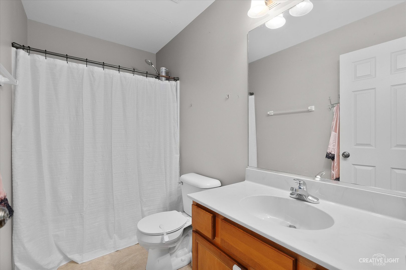 605 Ramsden Road Plano, IL 60545 - Photo 13 of 22 a bathroom with a sink and a toilet