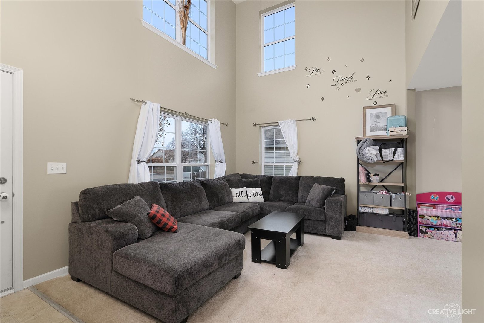 605 Ramsden Road Plano, IL 60545 - Photo 3 of 22 a living room with furniture and a couch