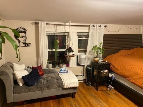 7 Granite Street, Unit 2 Cambridge, MA 02139 - Photo 13 of 31 a bedroom with bed and window
