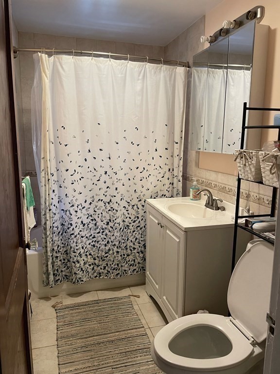 7 Granite Street, Unit 2 Cambridge, MA 02139 - Photo 16 of 31 a bathroom with a sink toilet and shower
