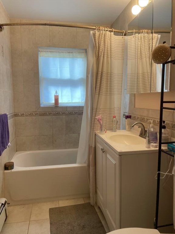 7 Granite Street, Unit 2 Cambridge, MA 02139 - Photo 17 of 31 a bathroom with a sink and a bathtub