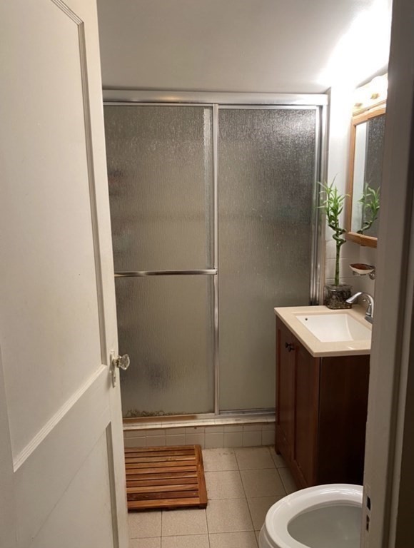 7 Granite Street, Unit 2 Cambridge, MA 02139 - Photo 19 of 31 a bathroom with a sink a toilet and shower