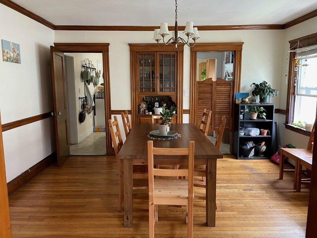 7 Granite Street, Unit 2 Cambridge, MA 02139 - Photo 2 of 31 a view of a livingroom with furniture window and wooden floor