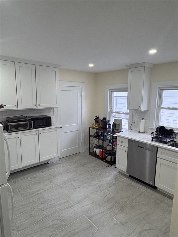 7 Granite Street, Unit 2 Cambridge, MA 02139 - Photo 3 of 31 a view of kitchen with cabinets and window