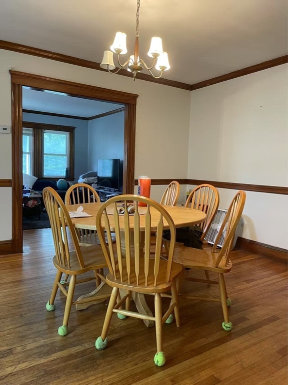 7 Granite Street, Unit 2 Cambridge, MA 02139 - Photo 6 of 31 a view of a dining room with furniture and wooden floor