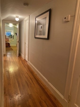 7 Granite Street, Unit 2 Cambridge, MA 02139 - Photo 10 of 31 a view of hallway with wooden floor