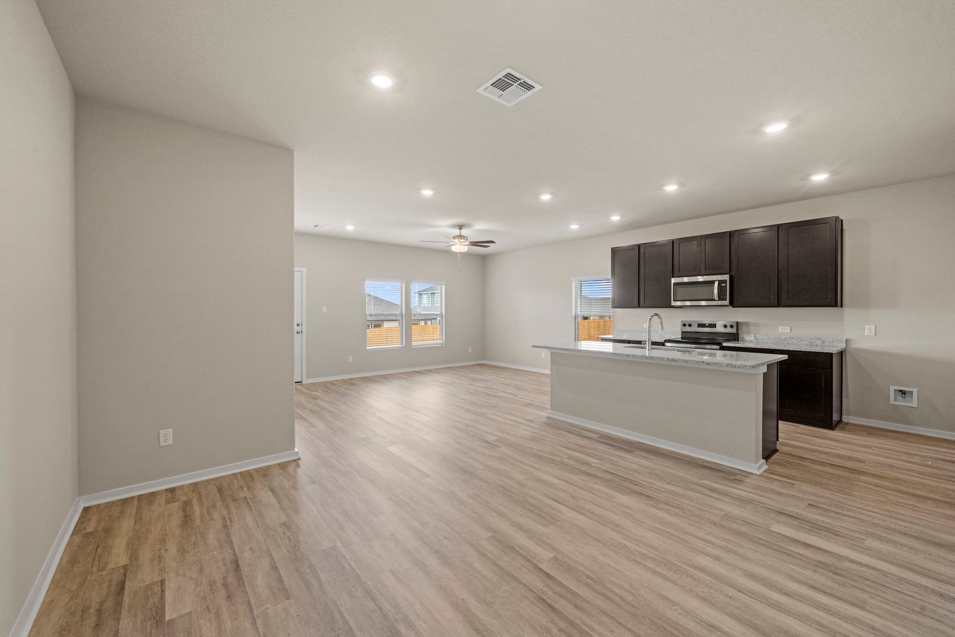 160 Wind Hill Jarrell, TX 76537 - Photo 15 of 27 From Family Room to Open Concept Kitchen