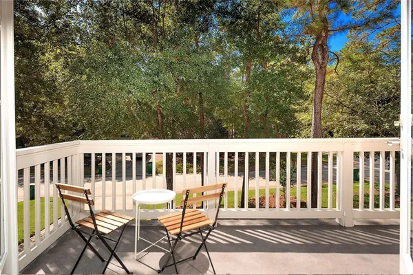 a backyard of a house with yard barbeque oven and outdoor seating
