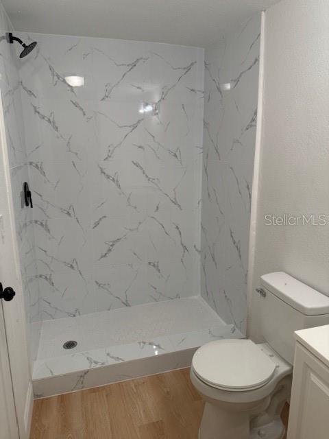 4605 North Hubert Avenue, Unit 21 Tampa, FL 33614 - Photo 5 of 12 a bathroom with a toilet and a shower