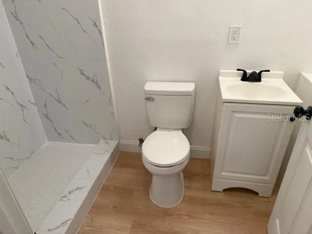 a bathroom with a sink and a toilet