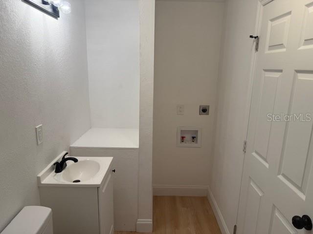 4605 North Hubert Avenue, Unit 21 Tampa, FL 33614 - Photo 7 of 12 a bathroom with a sink toilet and view