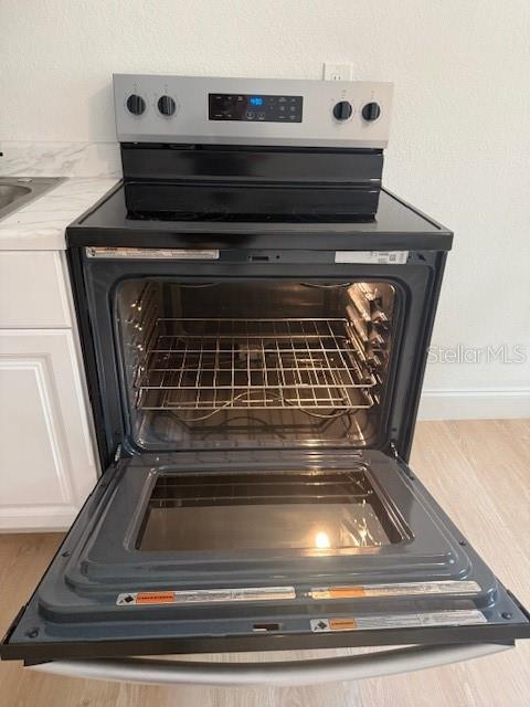 4605 North Hubert Avenue, Unit 21 Tampa, FL 33614 - Photo 9 of 12 a close view of fireplace