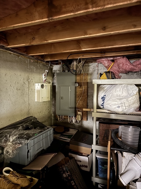 283 Fuller Road, Unit T Chicopee, MA 01020 - Photo 12 of 12 a room with furniture and a flat screen tv