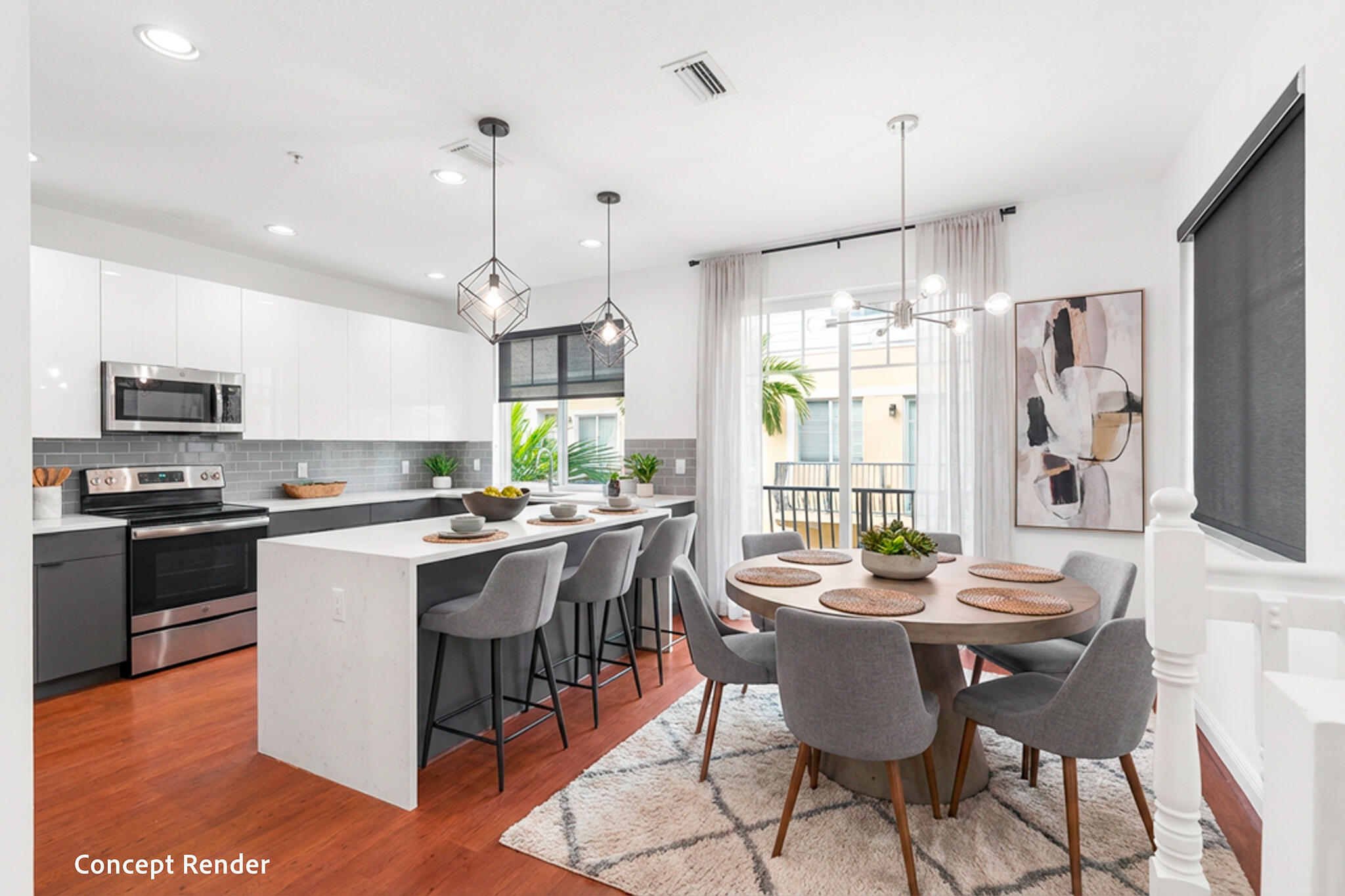 3830 Northwest 5th Terrace Boca Raton, FL 33431 - Photo 11 of 34 a kitchen with a dining table chairs stainless steel appliances and cabinets