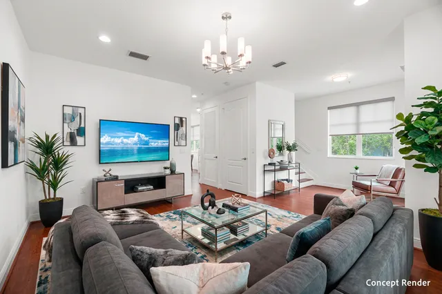 a living room with furniture a large window and a flat screen tv