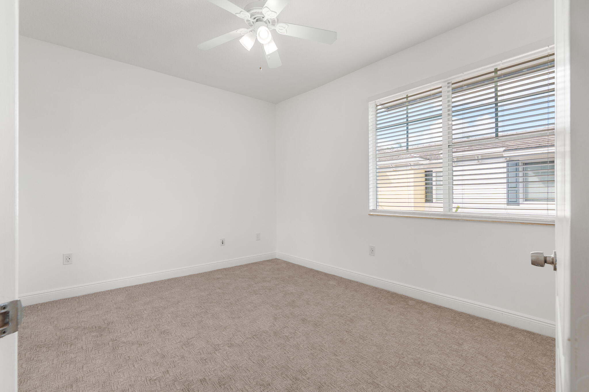 3830 Northwest 5th Terrace Boca Raton, FL 33431 - Photo 17 of 34 an empty room with a window