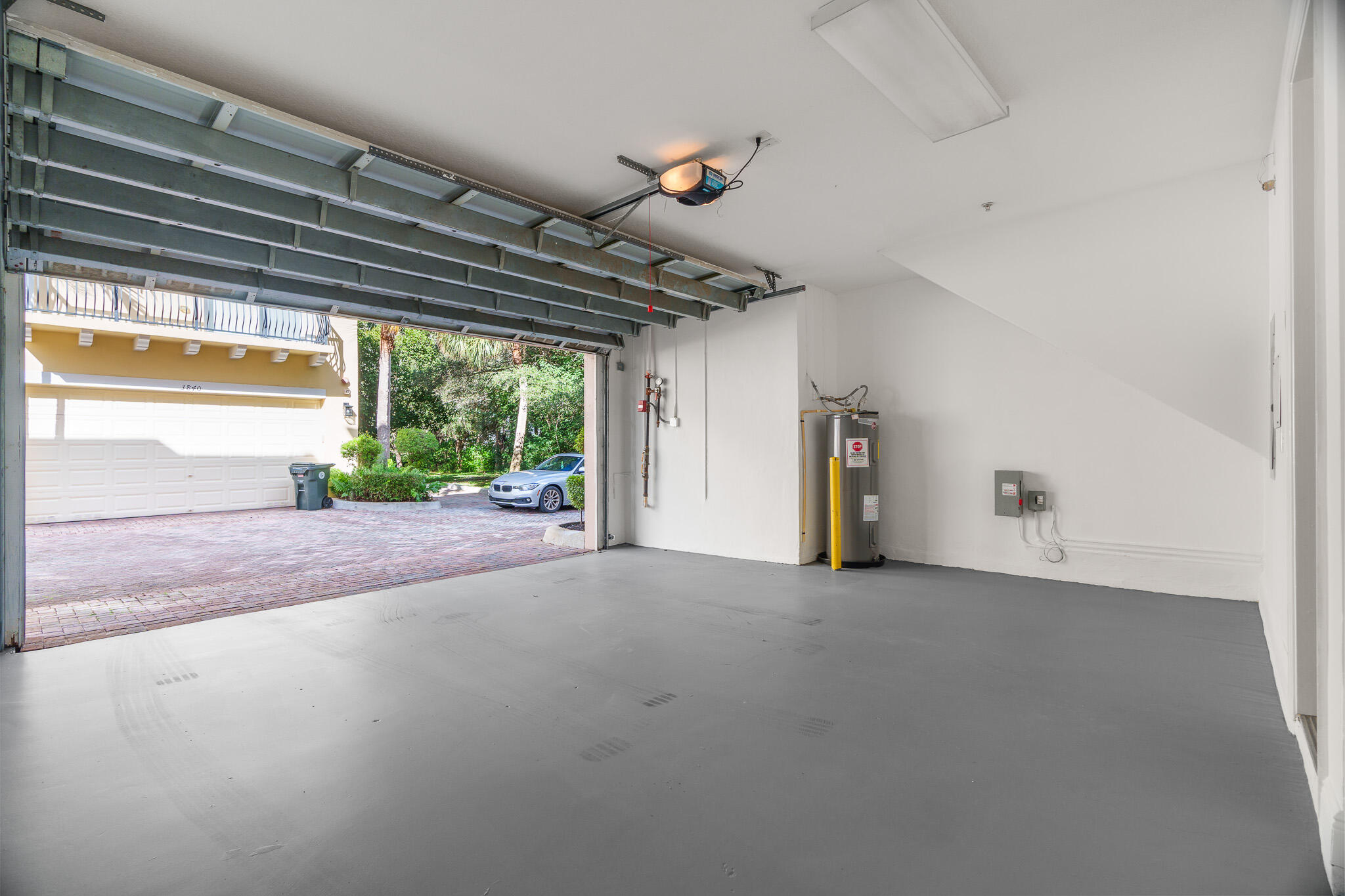 3830 Northwest 5th Terrace Boca Raton, FL 33431 - Photo 2 of 34 a view of a room with large windows and a table