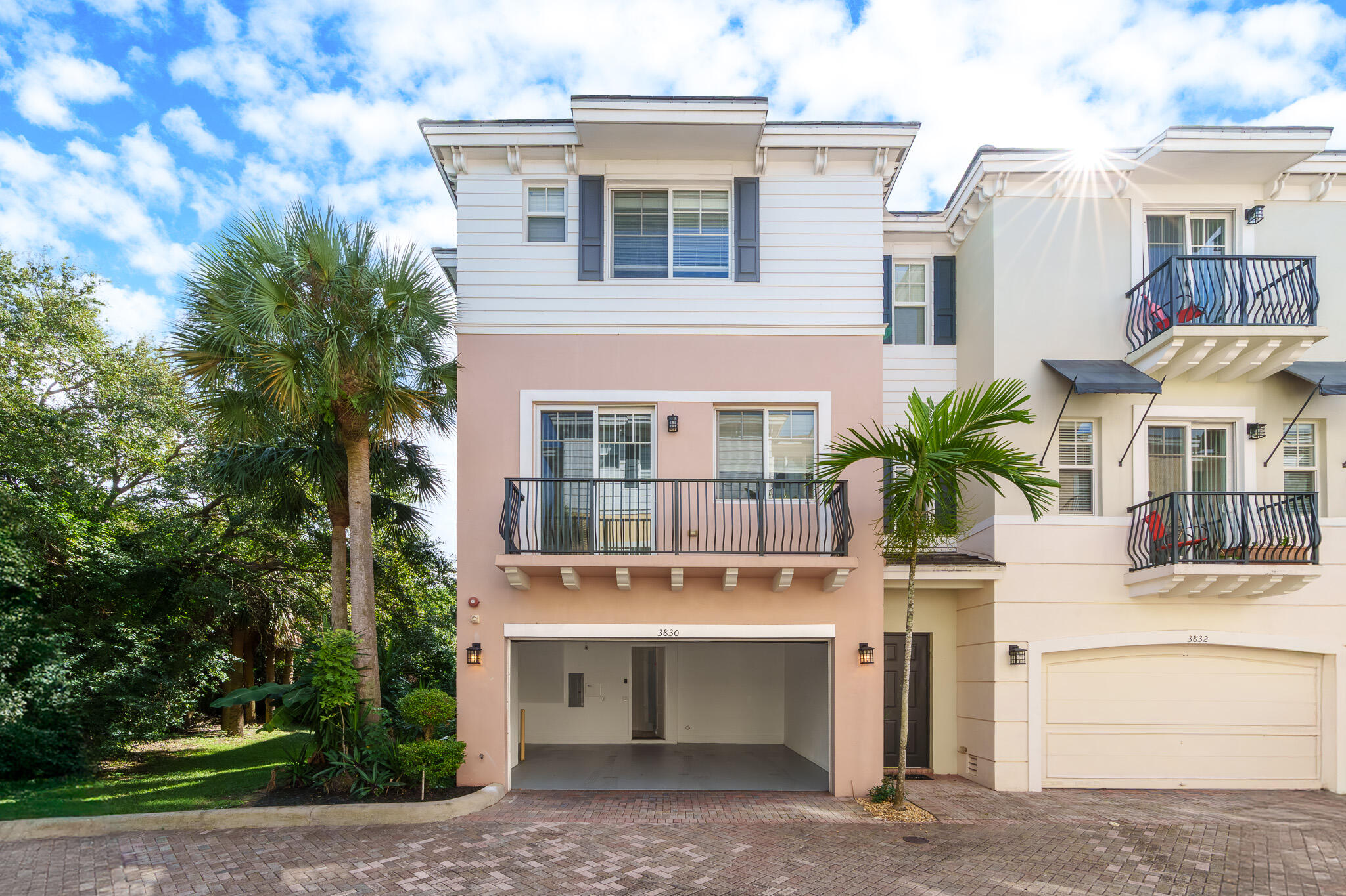 3830 Northwest 5th Terrace Boca Raton, FL 33431 - Photo 28 of 34 a front view of a building with garden