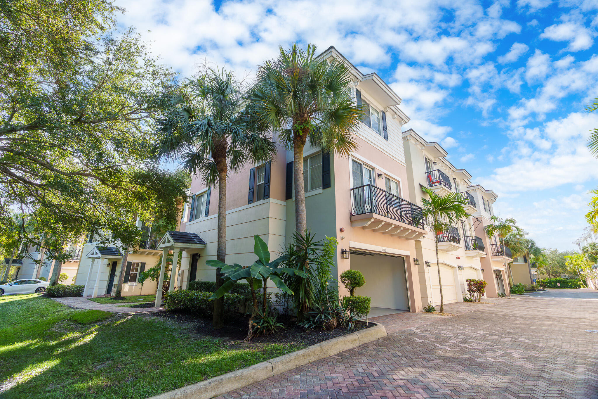 3830 Northwest 5th Terrace Boca Raton, FL 33431 - Photo 30 of 34 a front view of a house with a garden