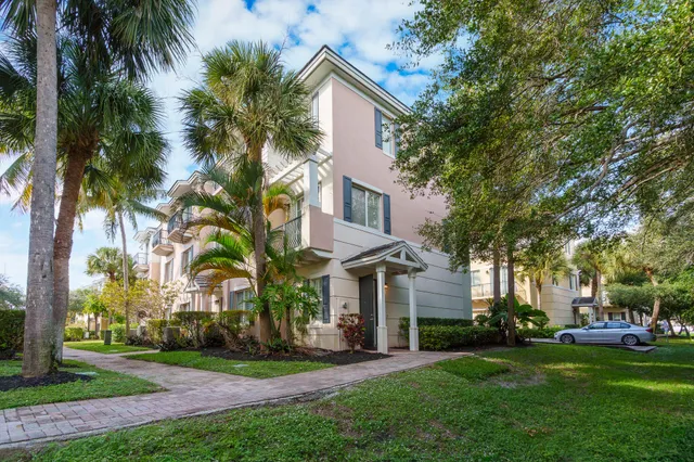 a bathroom with a shower and a glass door