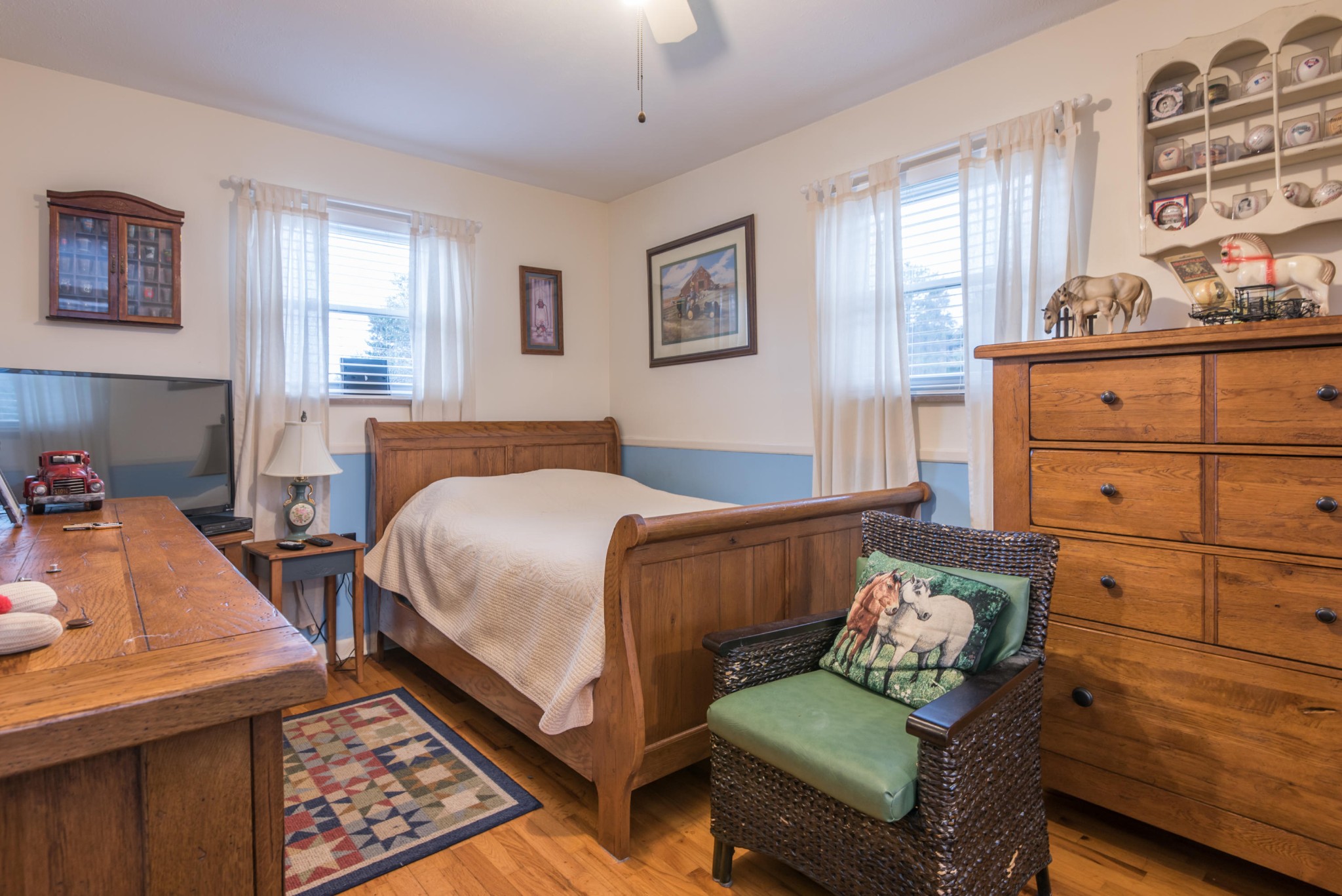 275 North Ridge View Road Luttrell, TN 37779 - Photo 11 of 27 a bedroom with a bed and wooden floor