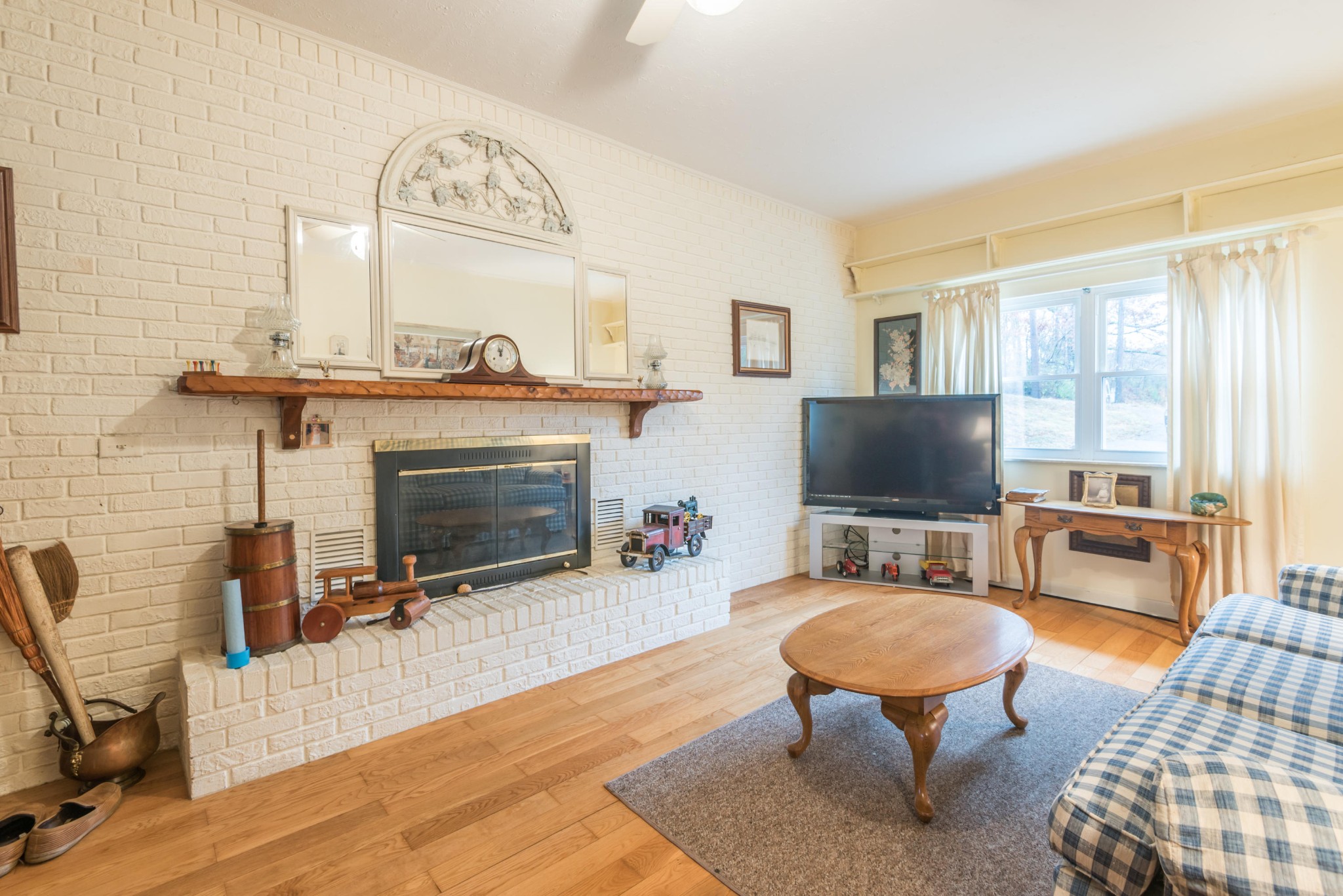 275 North Ridge View Road Luttrell, TN 37779 - Photo 19 of 27 a living room with furniture a flat screen tv and a fireplace