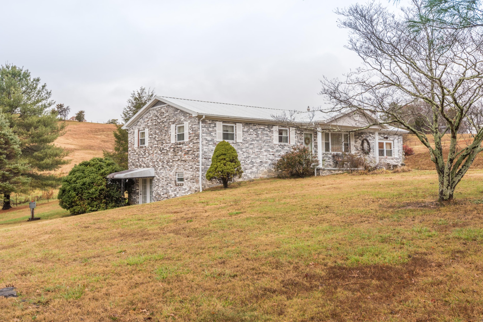 275 North Ridge View Road Luttrell, TN 37779 - Photo 2 of 27 a front view of house with yard and trees around