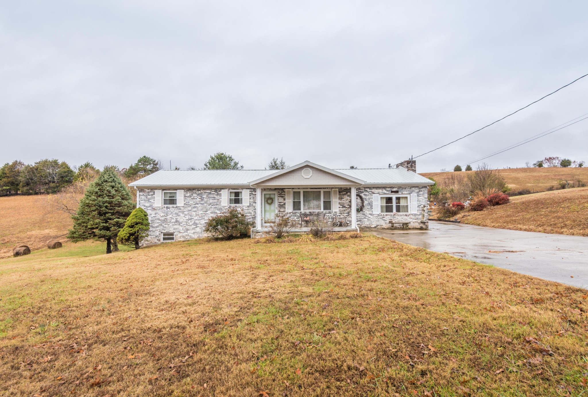 275 North Ridge View Road Luttrell, TN 37779 - Photo 27 of 27 a front view of a house with a yard and garage