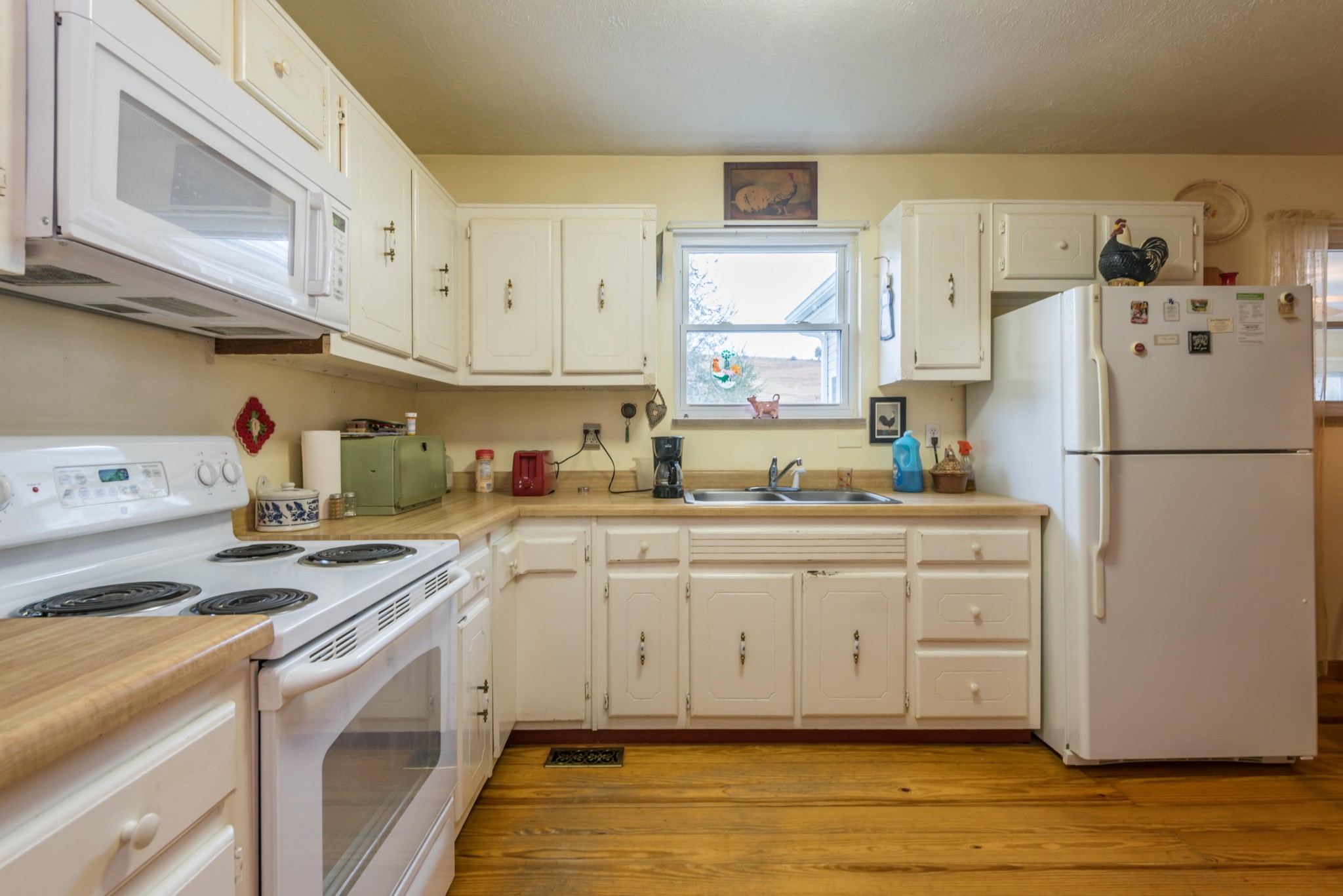 275 North Ridge View Road Luttrell, TN 37779 - Photo 7 of 27 a kitchen with stainless steel appliances granite countertop a refrigerator sink and cabinets