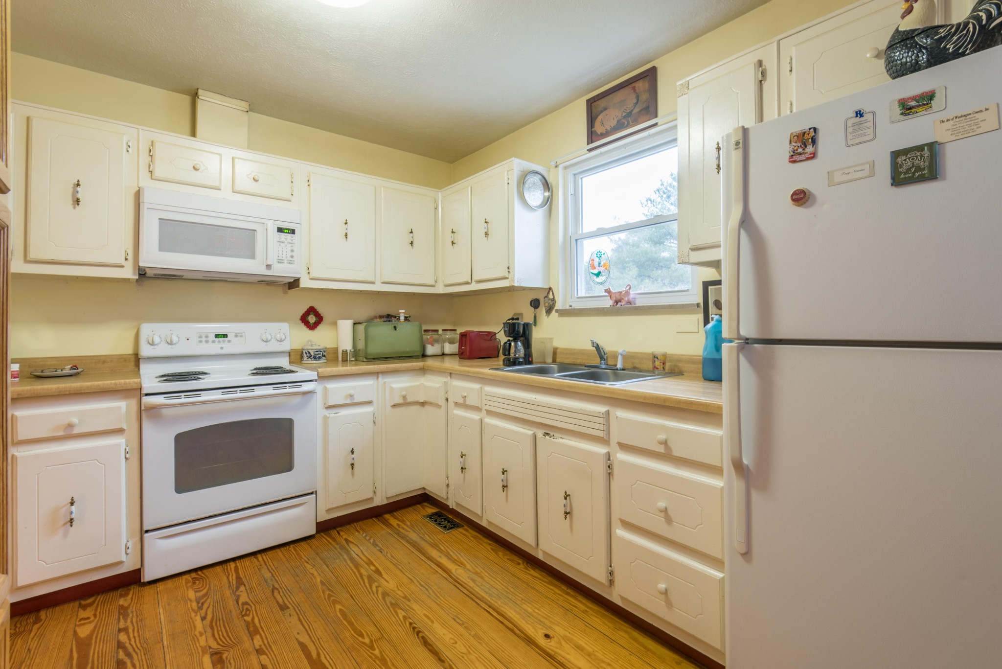 275 North Ridge View Road Luttrell, TN 37779 - Photo 8 of 27 a kitchen with cabinets stainless steel appliances and a window