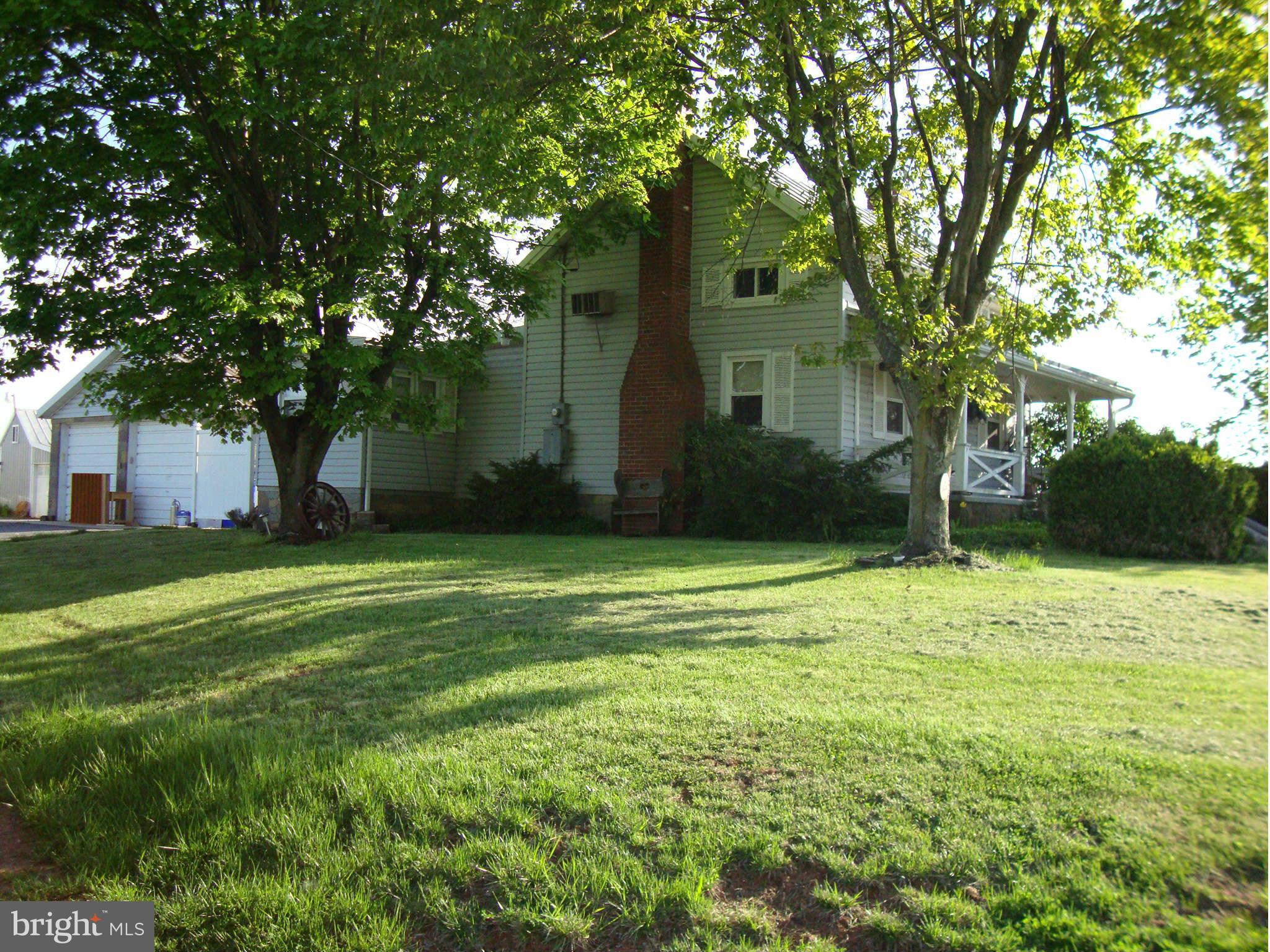 9709 Appolds Road Rocky Ridge, MD 21778 - Photo 1 of 13 a backyard of a house with lots of green space