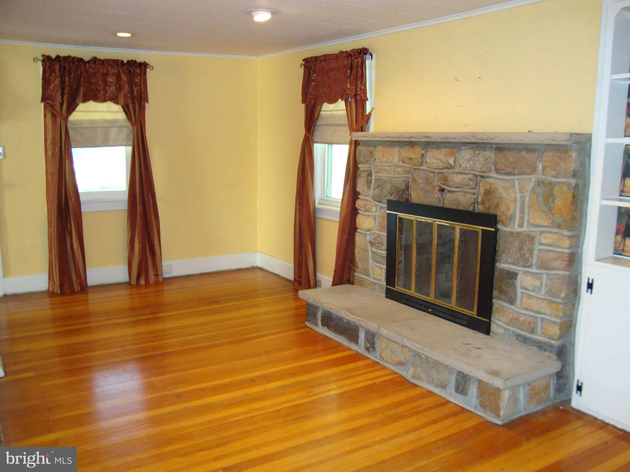 9709 Appolds Road Rocky Ridge, MD 21778 - Photo 4 of 13 a view of livingroom with hardwood floor and front door