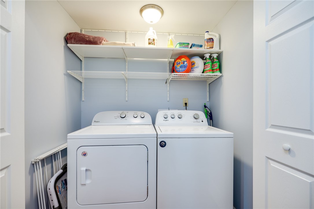 6950 Red Lion 5 Points Road Springboro, OH 45066 - Photo 37 of 78 This dedicated laundry space offers convenience with ample storage.