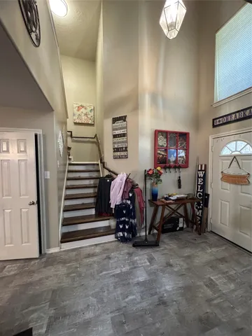 a view of game room with window and couch