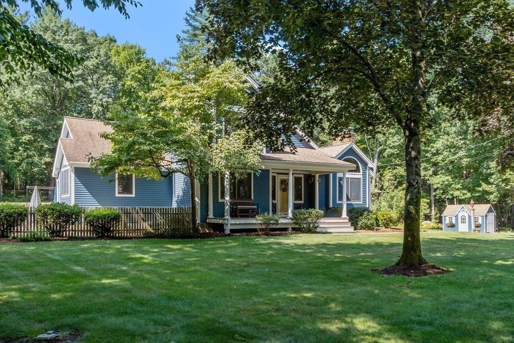 77 Turner Road Townsend, MA 01469 - Photo 3 of 34 a front view of a house with garden