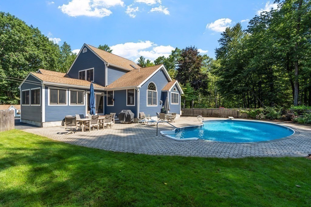 77 Turner Road Townsend, MA 01469 - Photo 6 of 34 a view of a house with backyard and sitting area