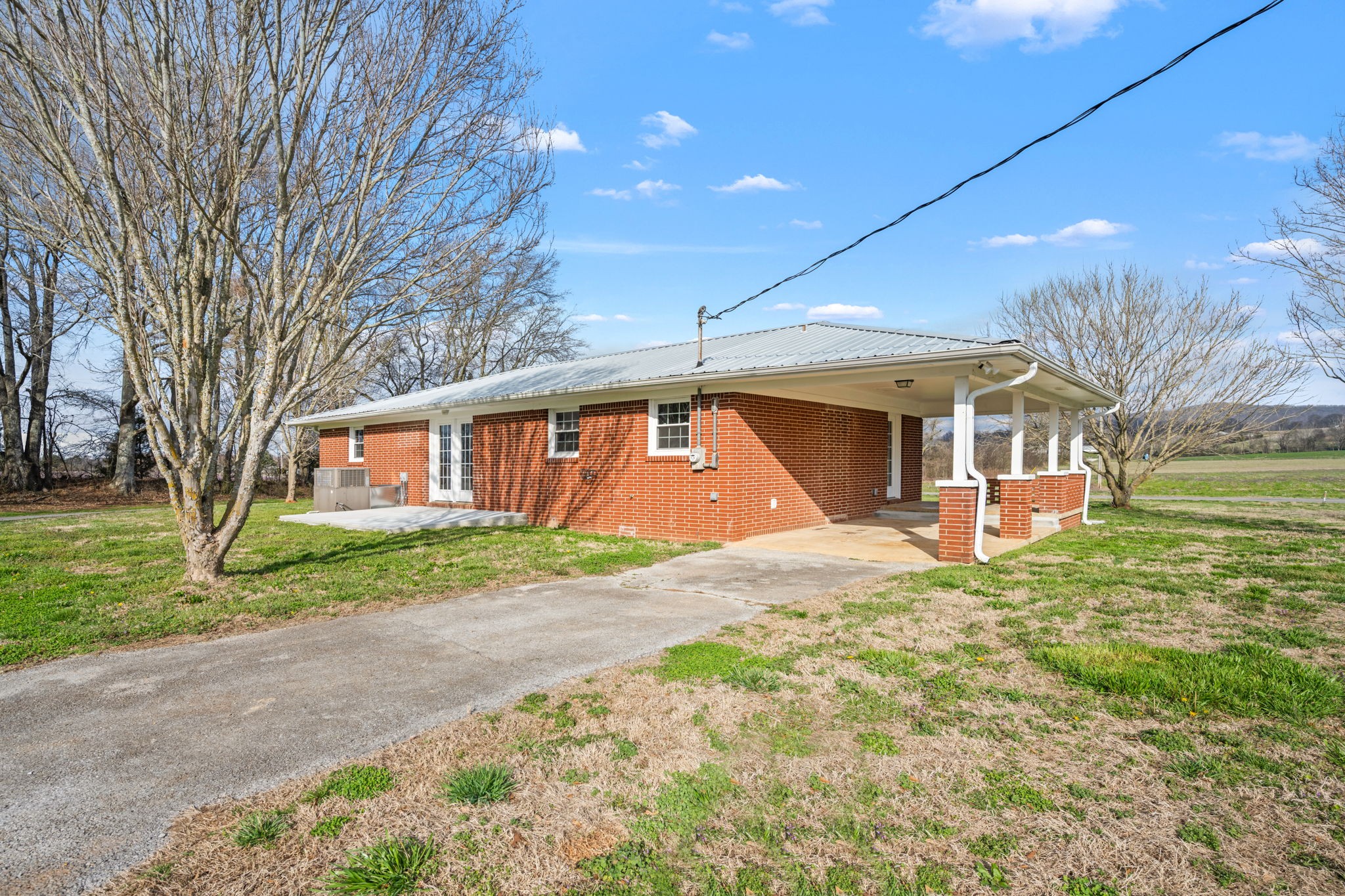 456 Whites Gap Road Huntland, TN 37345 - Photo 30 of 35 a front view of a house with a yard