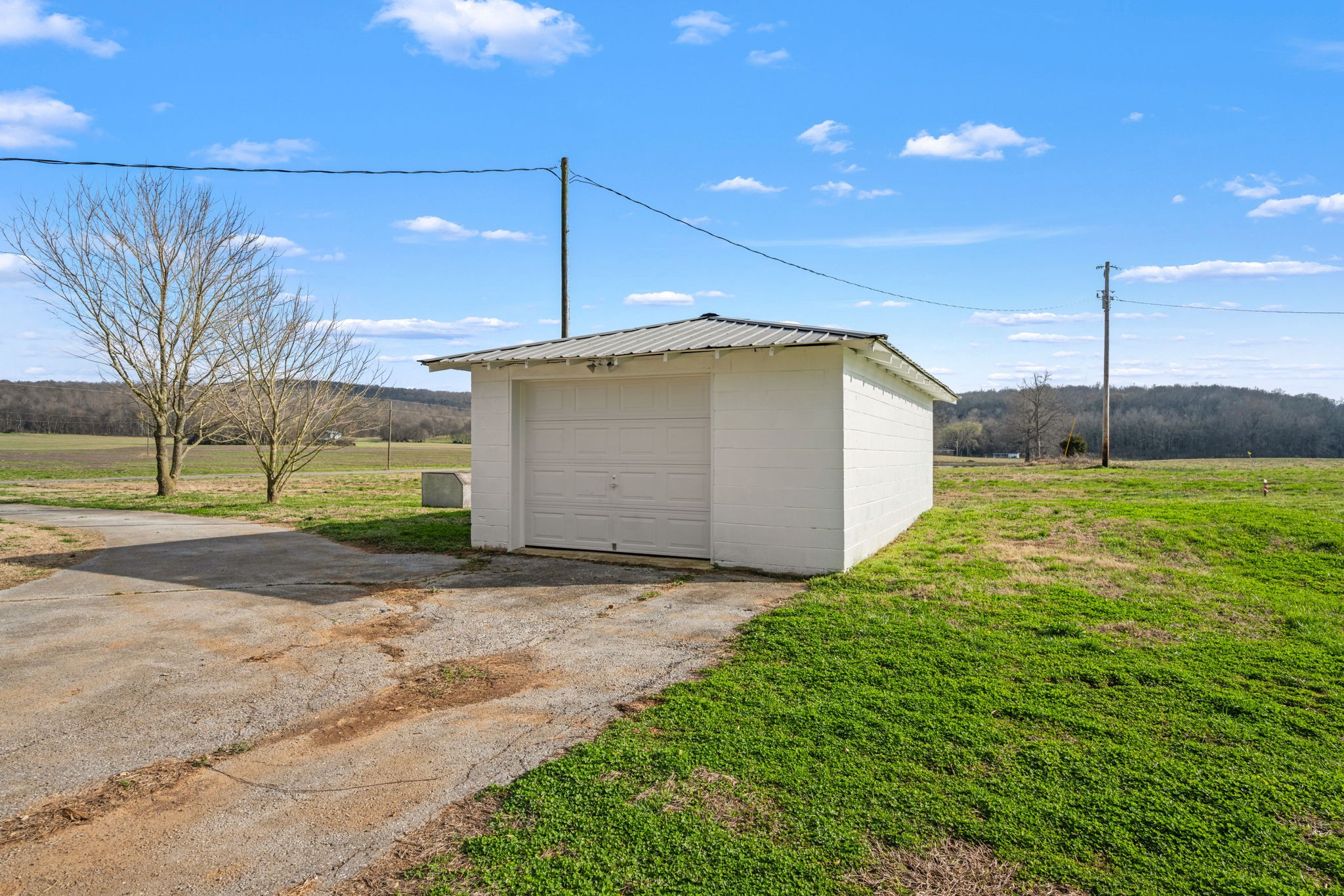 456 Whites Gap Road Huntland, TN 37345 - Photo 34 of 35 a backyard of a house with a yard and outdoor seating