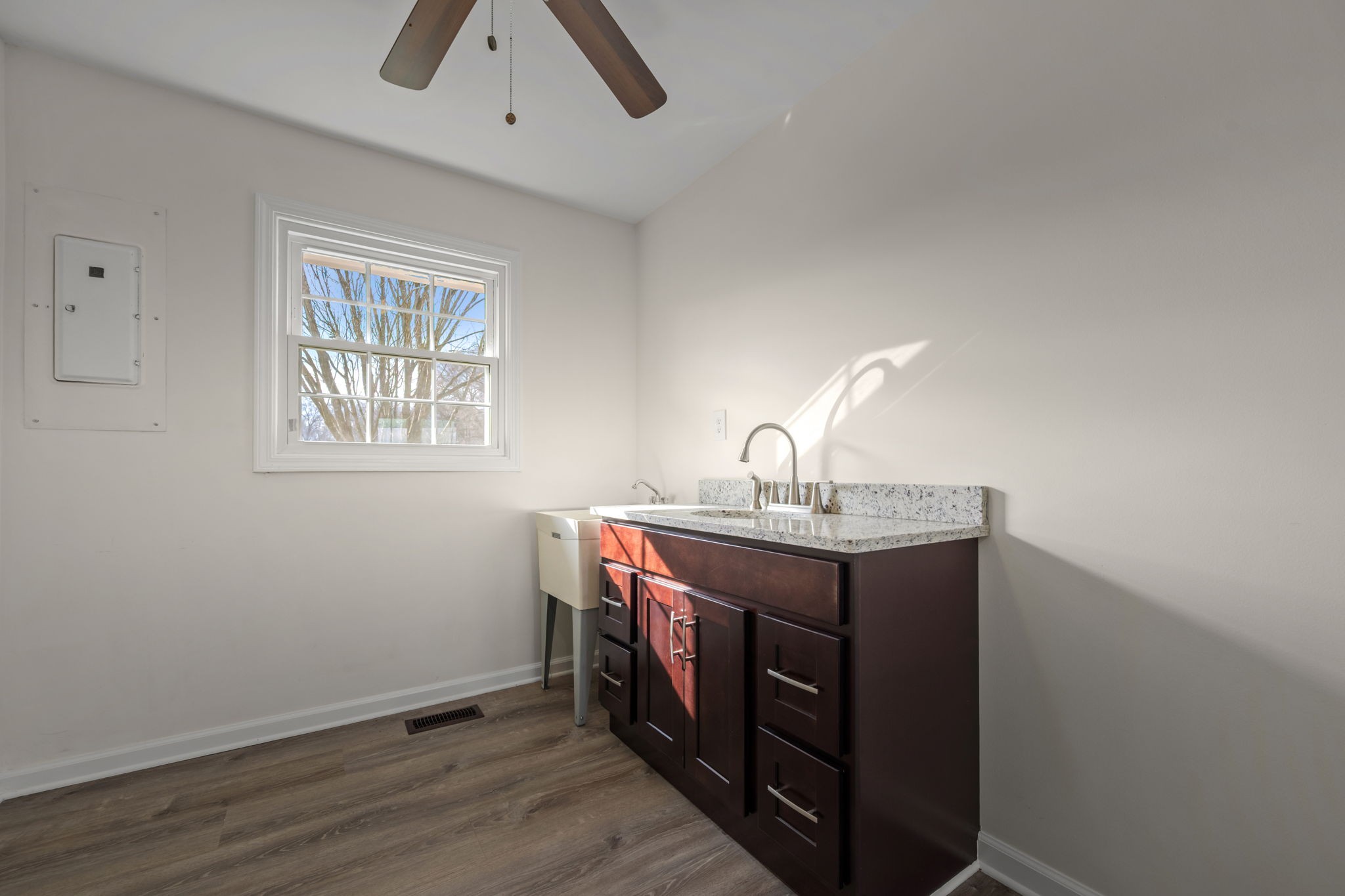 456 Whites Gap Road Huntland, TN 37345 - Photo 9 of 35 a utility room with a sink dryer and washer