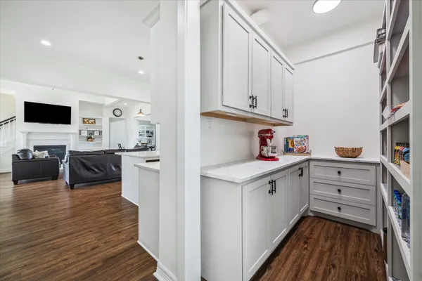 a kitchen with wooden cabinets and sink